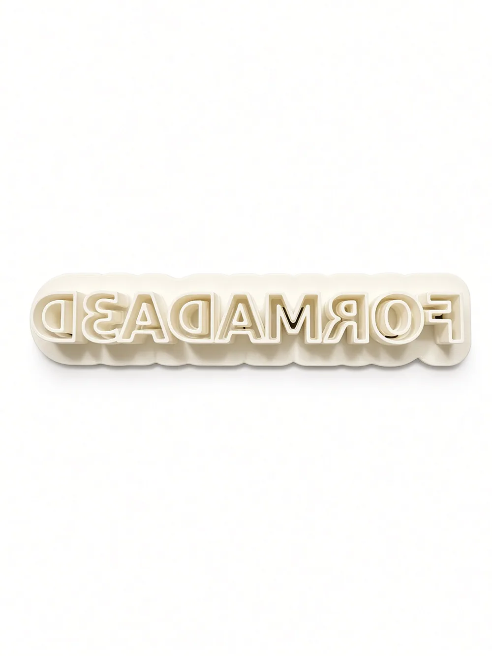 Formada3D word cookie cutter, top view (letters mirrored so the imprint reads correctly)