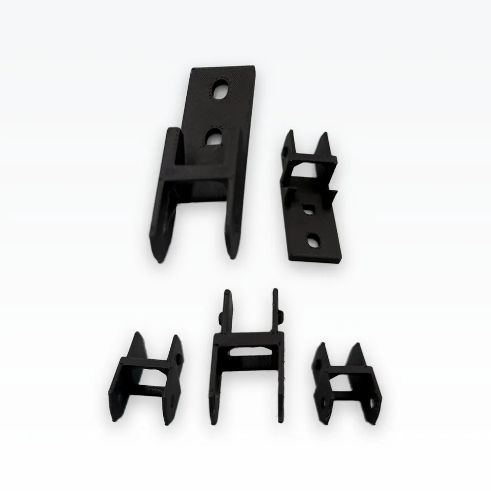 Black 3D printed 15 x 15 cable drag chain links and end mounts