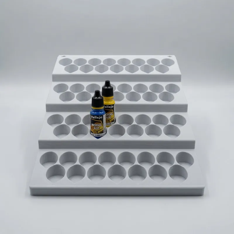 Paint Rack 60 in white with a Vallejo dropper bottle on the top tier