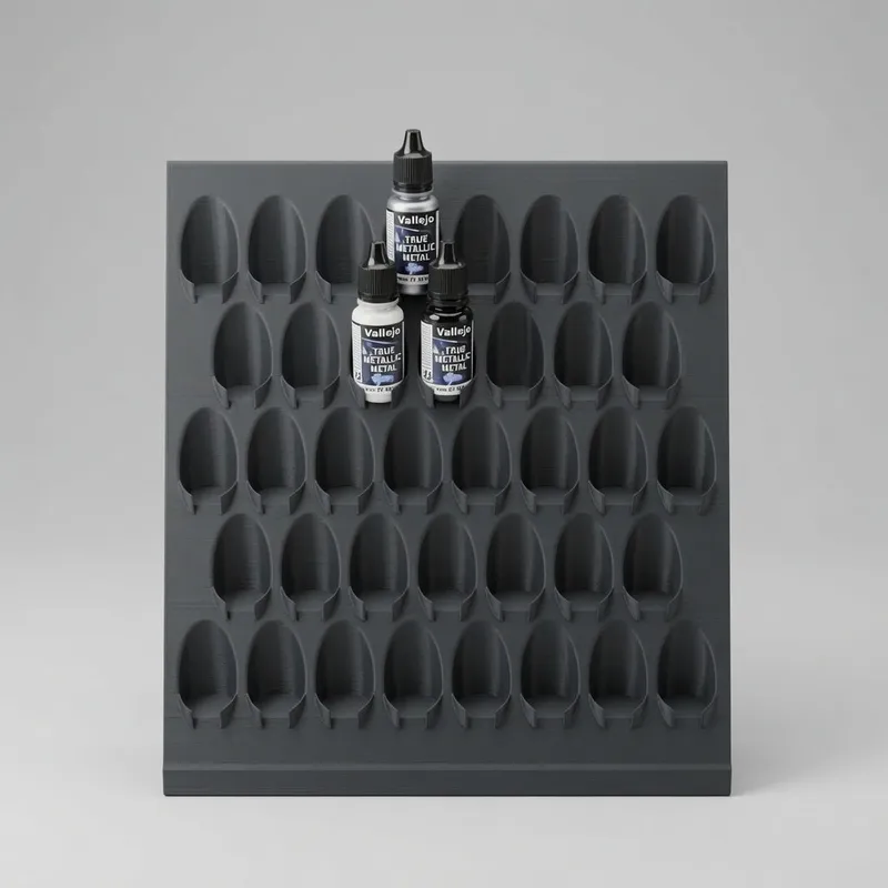 Paint Rack 38 wall rack, charcoal, with three Vallejo dropper bottles in the top row