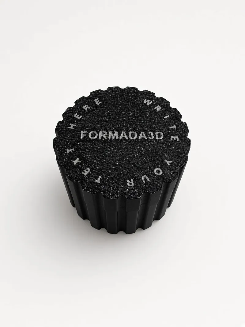 Black 3D printed screw-top box with FORMADA3D text on the lid