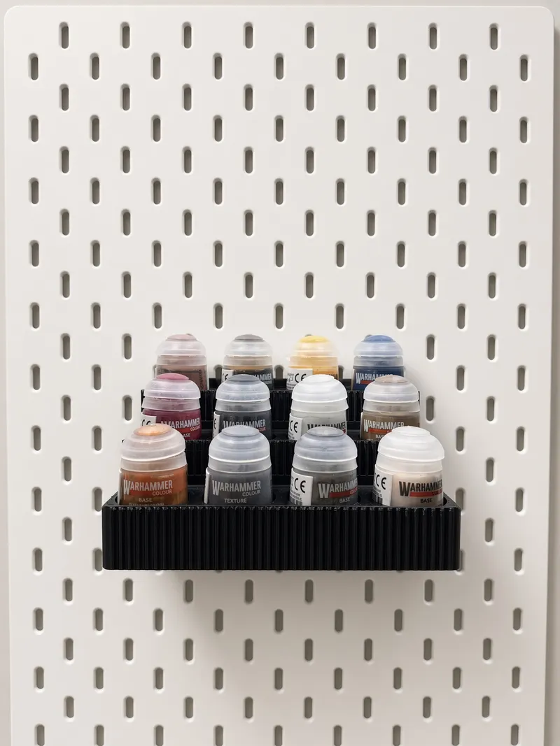 SKÅDIS Paint Shelf clipped onto an IKEA SKÅDIS pegboard, Citadel Edition shown loaded with pots