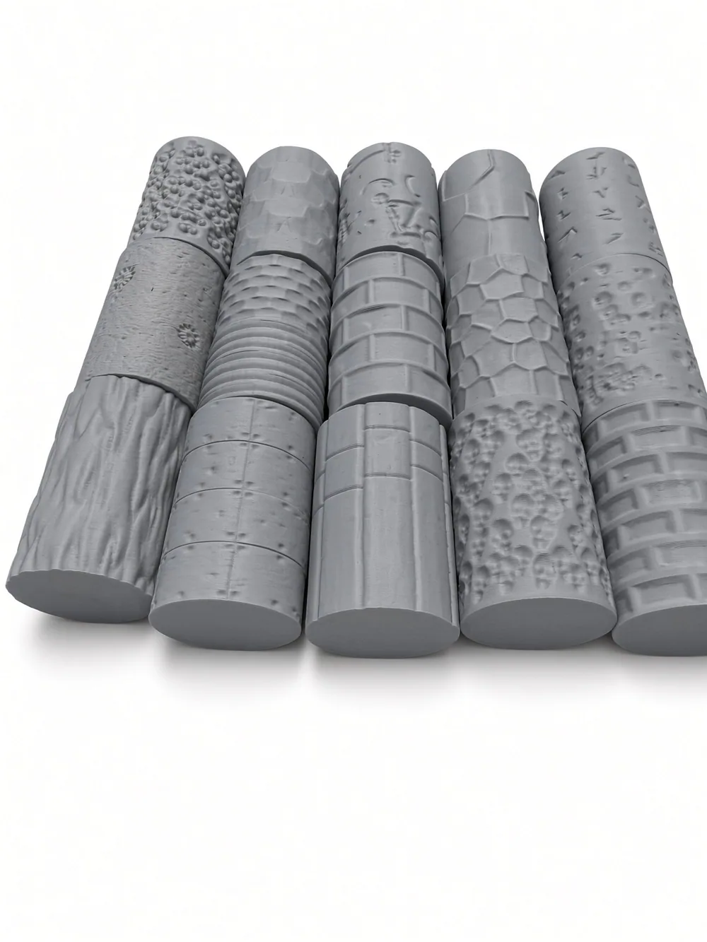 Ten 3D-printed texture rollers from the Formada3D Roller Maker, grey PLA