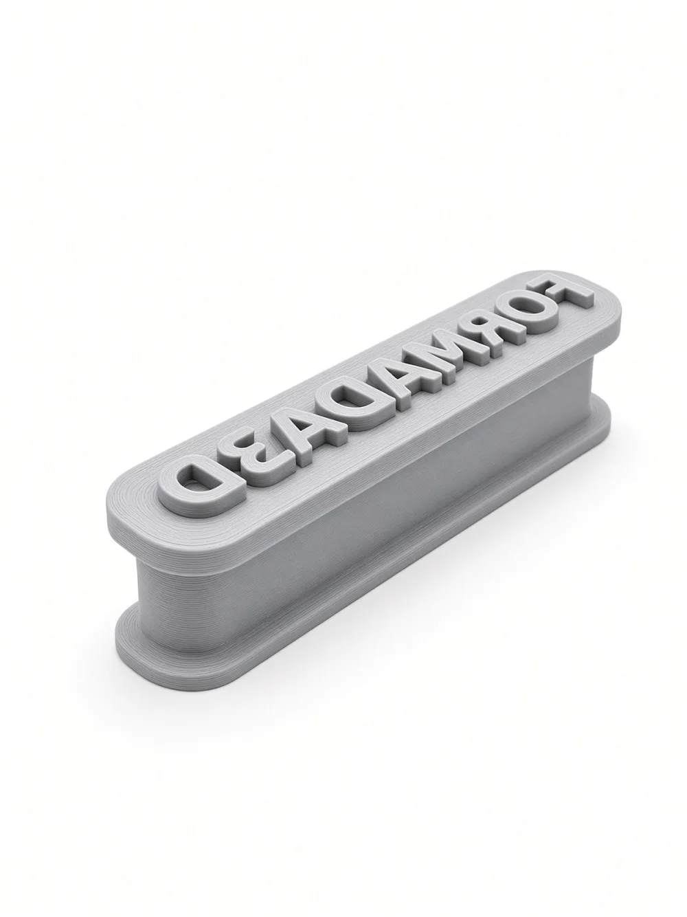 Custom text stamp printed from Stamp Maker, angle view showing the handle