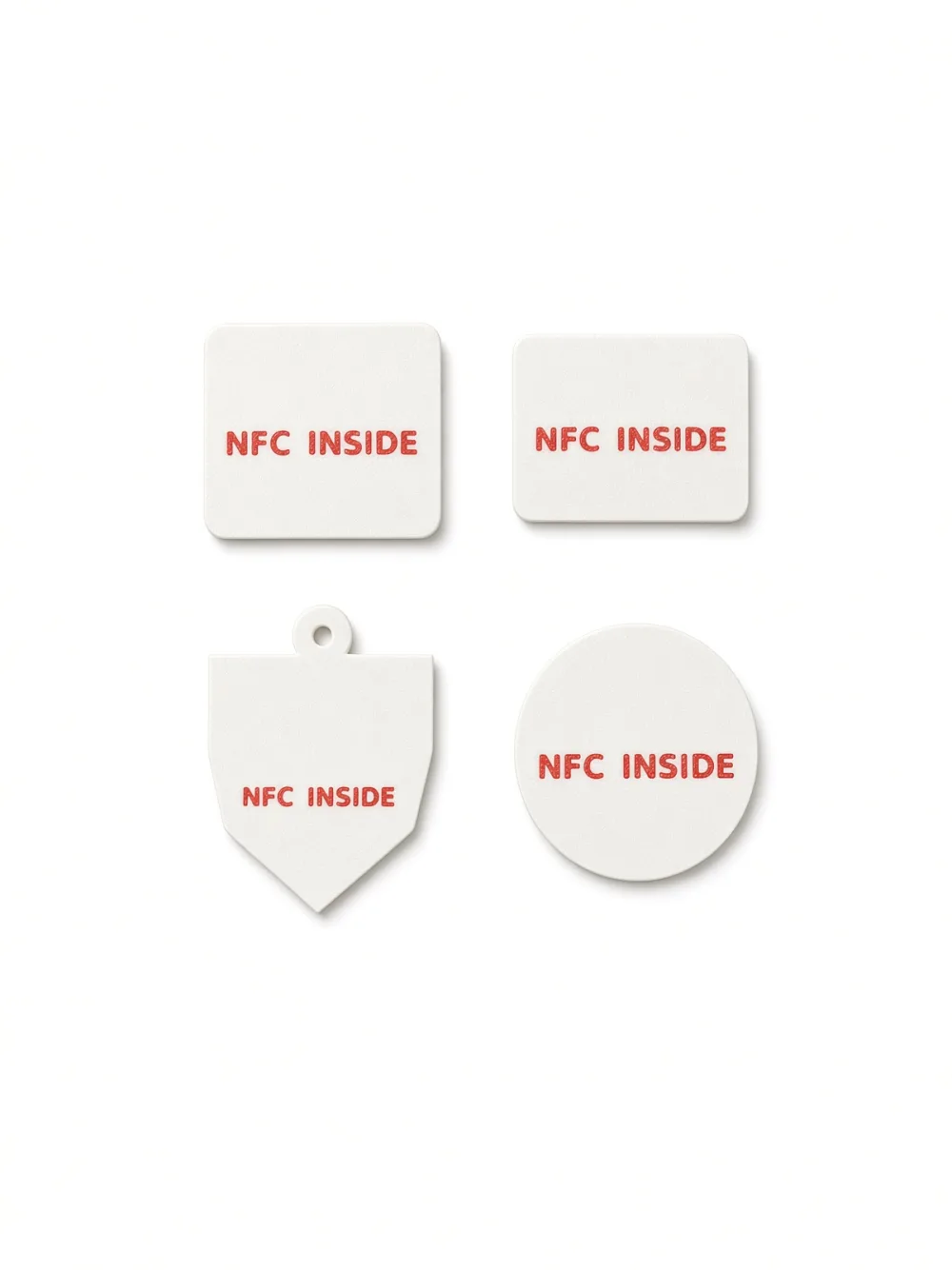 Backs of the four NFC tags showing the NFC INSIDE mark